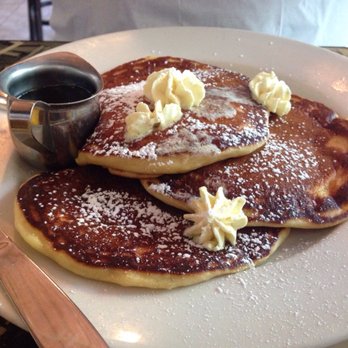 Americana - Special of the day: orange pancakes with orange butter. It was my partners meal and he loved it! - New American Near Me - Seattle, Washington Americana - Special of the day: orange pancakes with orange butter. It was my partners meal and he loved it! - New American Near Me - Seattle, Washington