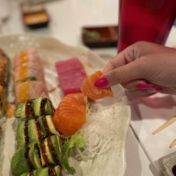 Sushi Village - My niece digging in!