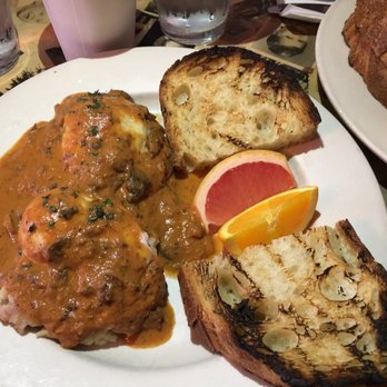 Americana - Eggs Benny with tomato sauce - New American Near Me - Seattle, Washington Americana - Eggs Benny with tomato sauce - New American Near Me - Seattle, Washington