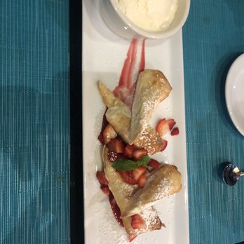 Perla Azul - This was on the house!! Super yummy crispy lightly fried cheesecake with strawberries and vanilla ice cream on the side.. so delectable! - Seafood Near Me - La Habra, California