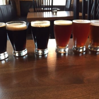 Hinterland Brewery - Here are about 12 beers on tap all the time. I like the darker varies, and this a flight... - New American Near Me - Green Bay, Wisconsin