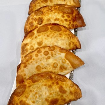 Villa Restaurant - a row of flatbreads on a plate - Mediterranean Near Me - Tujunga, California Villa Restaurant - a row of flatbreads on a plate - Mediterranean Near Me - Tujunga, California