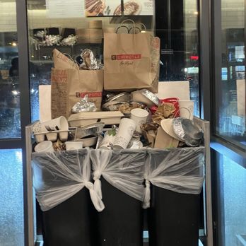 Chipotle Mexican Grill - overflowing trash, floor covered as well. - Fast Food Near Me - Lakeville, Minnesota