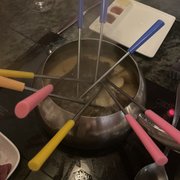 Photo of The Melting Pot - Columbus, OH, United States. Our broth with our skewers in there cooking up