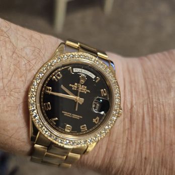 Carters; Jewelry - My 2005, 18Kt Rose Gold Oyster Perpetual Day Date Presidential Rolex Gold watch after the Gold Diamonds bezel installation. - Jewelry Near Me - St. Augustine, Florida Carters; Jewelry - My 2005, 18Kt Rose Gold Oyster Perpetual Day Date Presidential Rolex Gold watch after the Gold Diamonds bezel installation. - Jewelry Near Me - St. Augustine, Florida