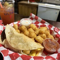 Senor Frogs - Breakfast Burrito and tots! Served till noon delicious and fresh