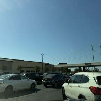 Costco Gasoline - Tight turn in to lanes leads to a bit of a chaotic backup - Gas Stations Near Me - Huntington Beach, California Costco Gasoline - Tight turn in to lanes leads to a bit of a chaotic backup - Gas Stations Near Me - Huntington Beach, California