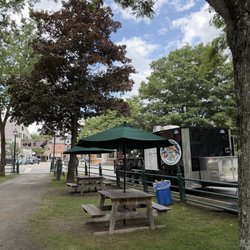 View of the food truck and picnic tables
