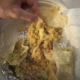 So much cheese, said NO cheese $$17 burrito with no meat come on So much cheese, said NO cheese $$17 burrito with no meat come on