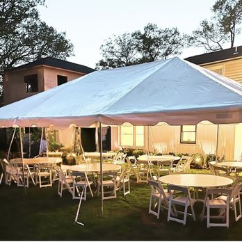 Party Squad - 20x30 tent with six round tables , eight chairs each, party, nighttime - Party Equipment Rentals Near Me Party Squad - 20x30 tent with six round tables , eight chairs each, party, nighttime - Party Equipment Rentals Near Me