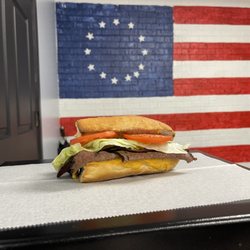 Lidzilla Roast beef Sharp cheese brown mustard lettuce tomato Served hot or cold