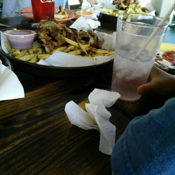 Phil's BBQ - Digging in! - Barbeque Near Me - San Diego, California