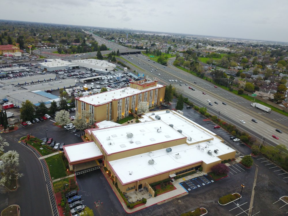 Slide of Flat Roof Pros