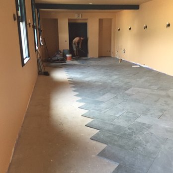 Morel Construction - Installing a Vermont Slate floor for a commercial dining hall. - General Contractors Near Me