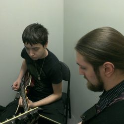 American Music Centre - Guitar Music Lessons