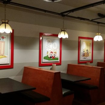 Sawmilly Sandwich Shoppe - Interior with booths and fun comics for atmosphere - Sandwiches Near Me - Riverside, Illinois