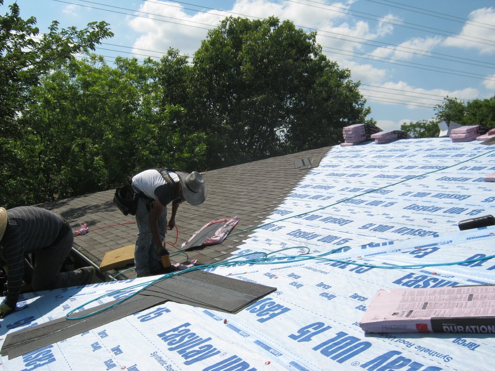 Slide of Norwood Roofing Systems