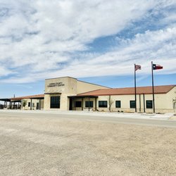 Outside view of entire building and parking