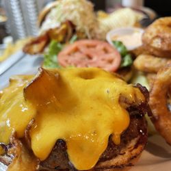 Ye Olde Durty Bird - The Durty Burger ...grilled 1/2 pound burger with smoked bacon, cheddar cheese and our famous Durty sauce (house BBQ sauce).