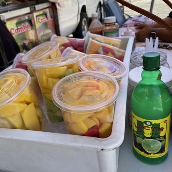 Jesus Hot Dogs - a tray of fruit and a bottle of soda - Food Trucks Near Me - Los Angeles, California