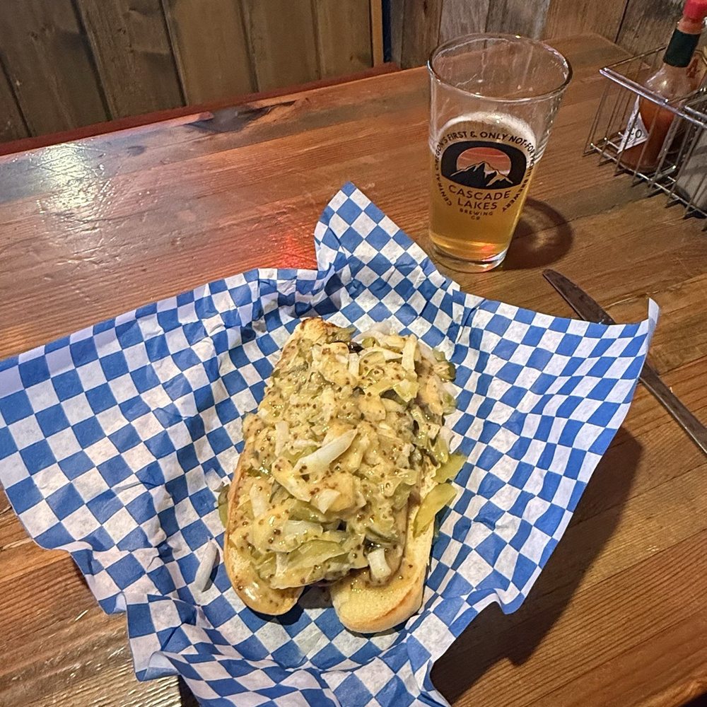 Bottoms Up Saloon - Sausage dog smothered in onions - Bars Near Me - Redmond, Oregon Bottoms Up Saloon - Sausage dog smothered in onions - Bars Near Me - Redmond, Oregon