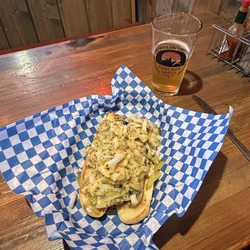 Bottoms Up Saloon - Sausage dog smothered in onions