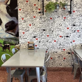 I Heart Mac & Cheese - a table and chairs - Comfort Food Near Me - Pembroke Pines, Florida