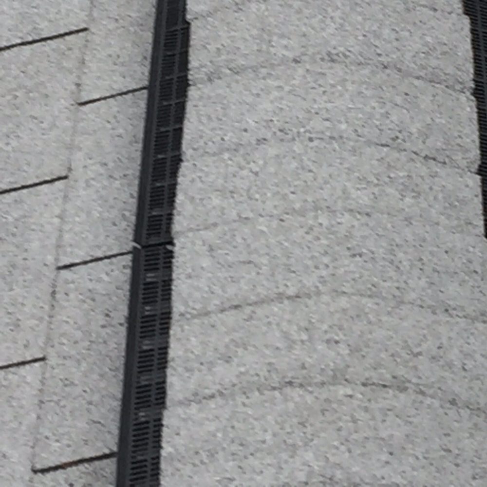 Slide of Alden Roofing