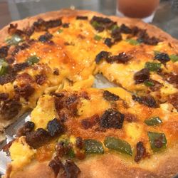 The Tap - Breakfast pizza with hot honey drizzle