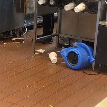 McDonald's - a dirty kitchen floor with a blue blower - Burgers Near Me - Mechanicville, New York McDonald's - a dirty kitchen floor with a blue blower - Burgers Near Me - Mechanicville, New York
