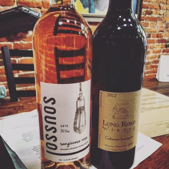 Sous Sol - two bottles of wine on a table - Wineries Near Me - Seattle, Washington Sous Sol - two bottles of wine on a table - Wineries Near Me - Seattle, Washington