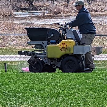 S Imperial Services - a man mowing a field - Lawn Services Near Me - Saginaw, Michigan