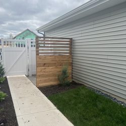 Straight Line Fence - Small fence to hide my trash  recycling bins.