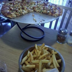 AJ's Wood Grill Pizza - BBQ Chicken Pizza and french fries at AJ's Wood Grill Pizza
