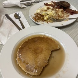 a plate of pancakes and a bowl of soup