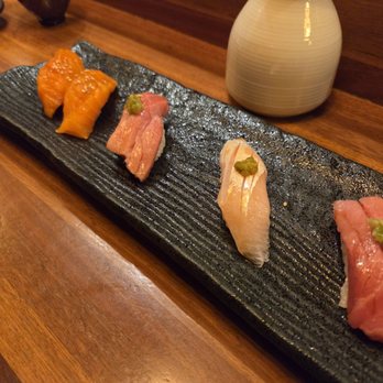 Omakase Kyara Sake Bar - Various single orders of nigiri. Left to right: 2 orders of King Salmon ($4.50), O Toro ($7.00), Kanpachi ($6.50), Chu Toro ($6.25) - Japanese Near Me - Las Vegas, Nevada Omakase Kyara Sake Bar - Various single orders of nigiri. Left to right: 2 orders of King Salmon ($4.50), O Toro ($7.00), Kanpachi ($6.50), Chu Toro ($6.25) - Japanese Near Me - Las Vegas, Nevada