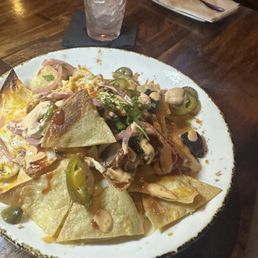 The nachos they brought to our table. $25?????? WHERES THE MEAT?? Where the substance??? WHERE's THE NACHOS THEY POSTED ONLINE The nachos they brought to our table. $25?????? WHERES THE MEAT?? Where the substance??? WHERE's THE NACHOS THEY POSTED ONLINE