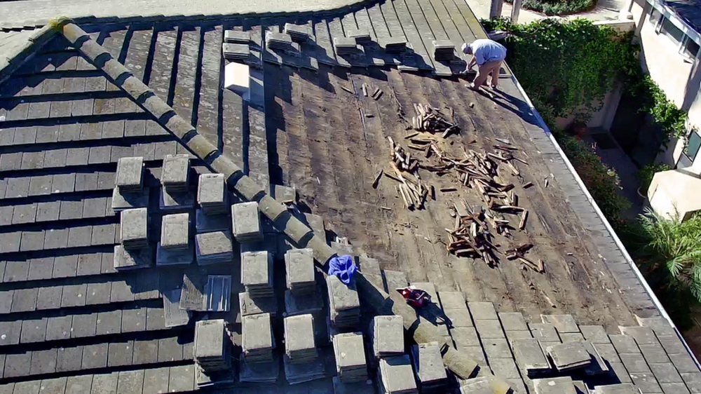 Slide of OC Roof Contractors