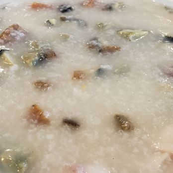 China Bistro - Close up seafood porridge (large order) with thousand egg added (+$3.00) - Cantonese Near Me - Rosemead, California China Bistro - Close up seafood porridge (large order) with thousand egg added (+$3.00) - Cantonese Near Me - Rosemead, California