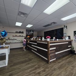 The Spot Nutrición - In a strip mall area perpendicular to the street and across from urgent care.