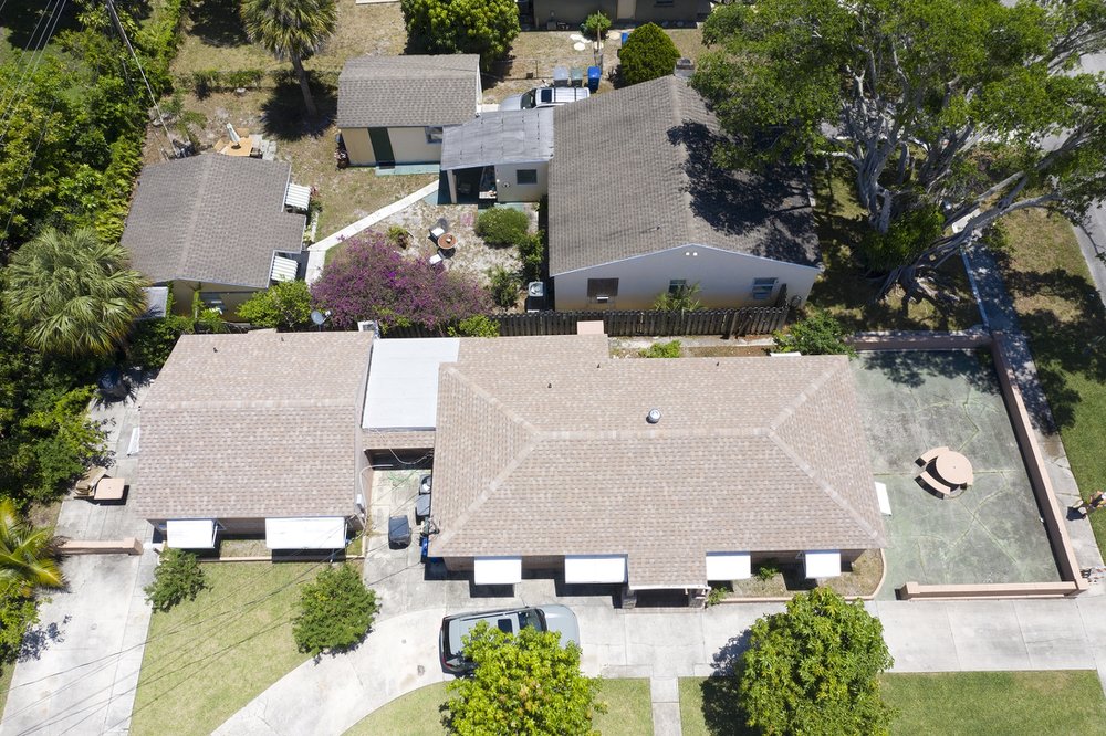 Slide of Louis Roofing