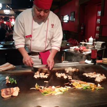 Benihana - Lombard - Chef Alex cooking Salmon, Chicken, and Shrimp w/Vegetables and Udon Noodles - Sushi Bars Near Me - Lombard, Illinois