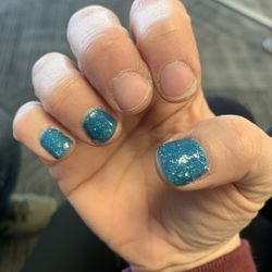 White Rose Day Spa &Hair Design - 2nd nail was peeling away less than 48 hours later.