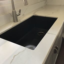 New single large black sink and new counters. New single large black sink and new counters.