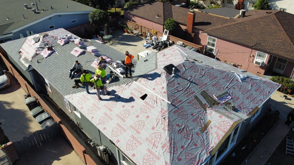 Slide of Home Town Roofing