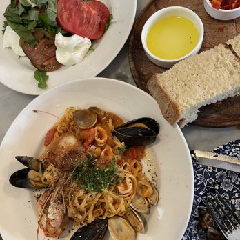 Terroni - Caprese con Mozzarella di Bufala Insalate and mixed seafood pasta. - Italian Near Me - Los Angeles, California Terroni - Caprese con Mozzarella di Bufala Insalate and mixed seafood pasta. - Italian Near Me - Los Angeles, California