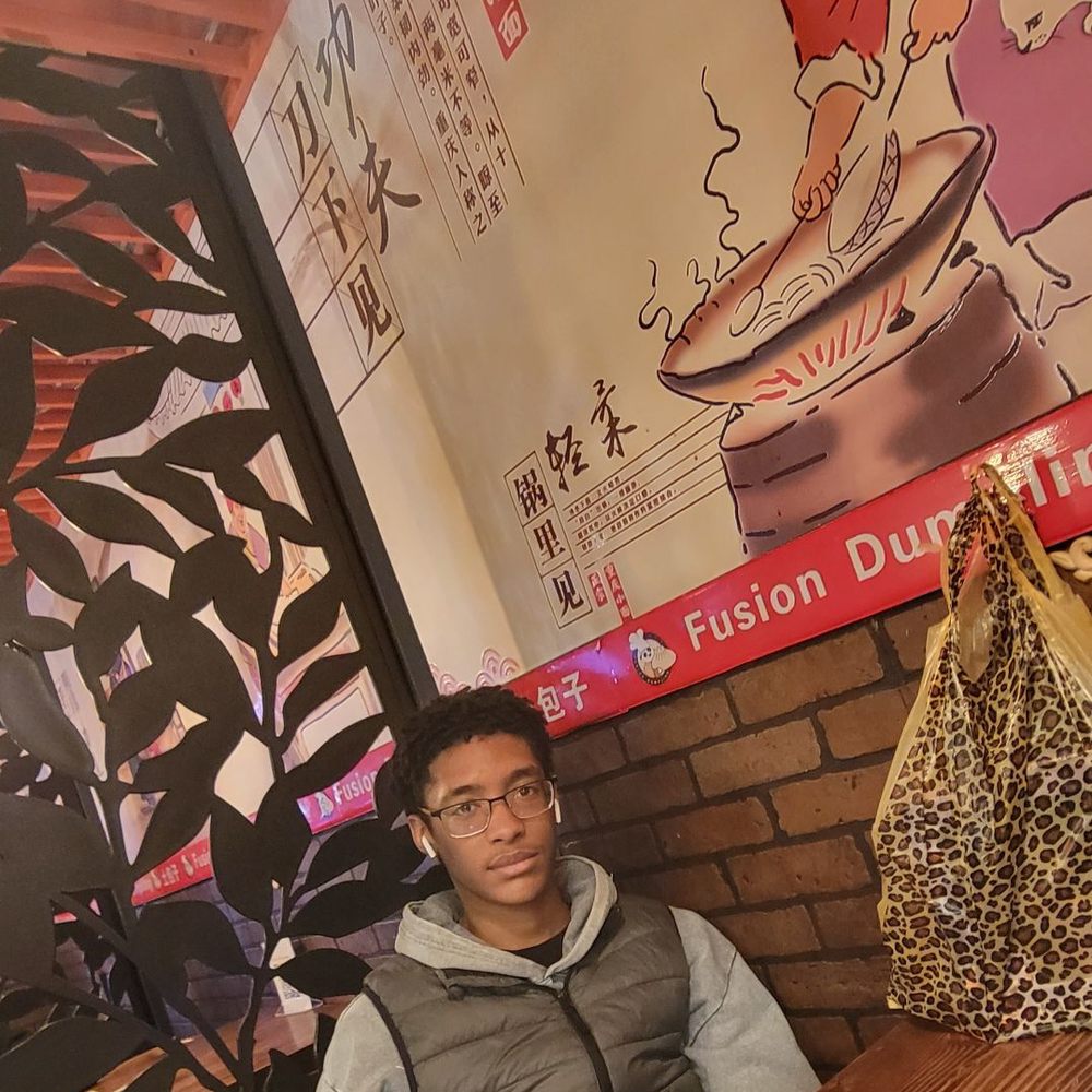 Fusion Dumpling - Hungry kid with wall art - Dim Sum Near Me - San Francisco, California