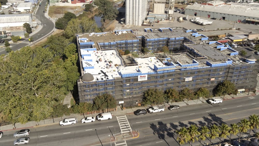 Slide of Henris Roofing