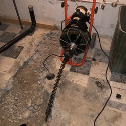 Planet Plumbing Svc - Snake drain with an electric guitar.