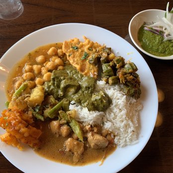 Curry Hut - Honey potatoes, spiced aloo subzi, channa masala, saag paneer, chicken curry, okra, bread pakora, rice, chutney, sliced onions. - Indian Near Me - Augusta, Georgia Curry Hut - Honey potatoes, spiced aloo subzi, channa masala, saag paneer, chicken curry, okra, bread pakora, rice, chutney, sliced onions. - Indian Near Me - Augusta, Georgia